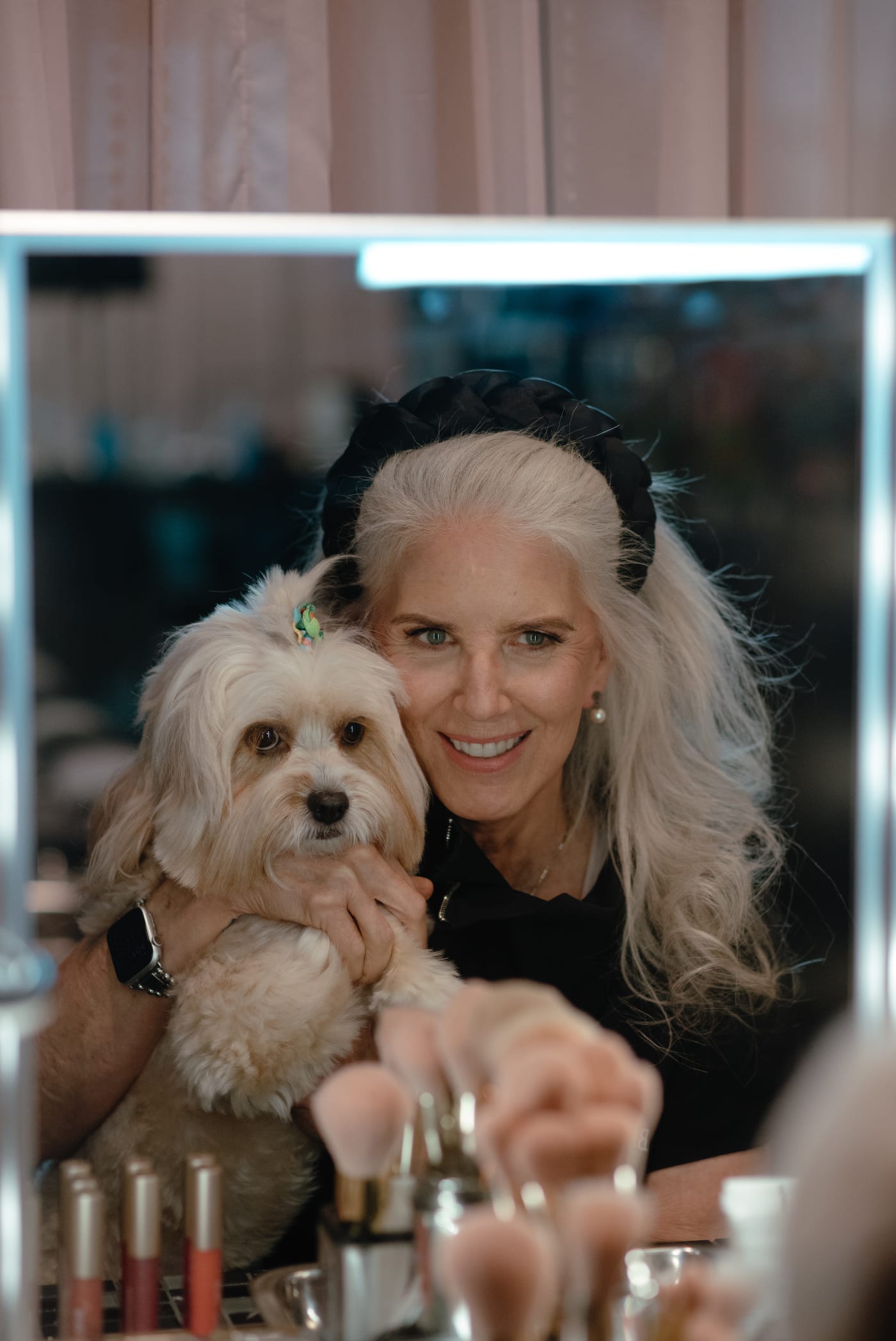 Nancy Reagan, founder of Bella Reina Spa, with her Cavapoo Henrietta