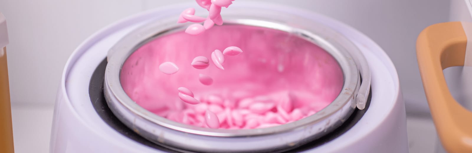 Their pink wax, mid-melt